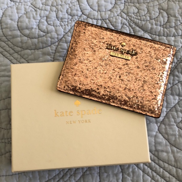 kate spade Handbags - Kate Spade rose gold card wallet.